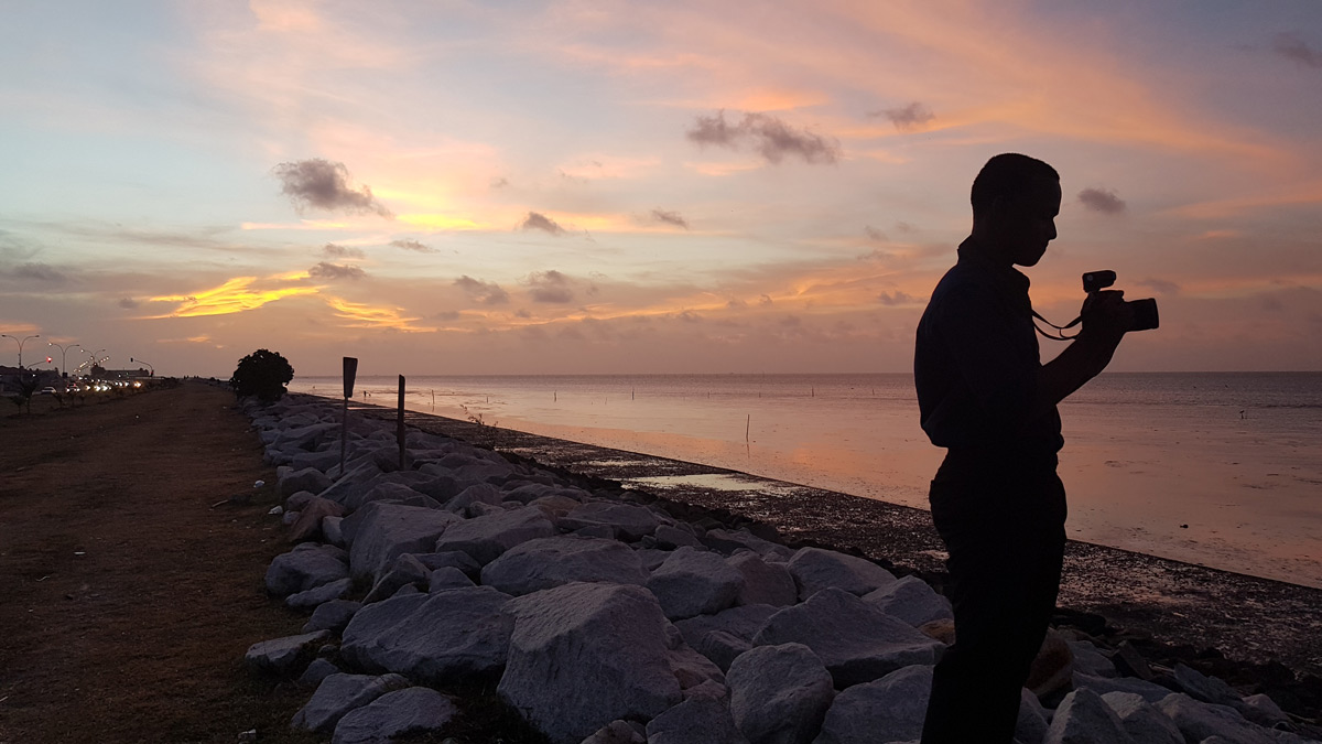 Taking photos at the seawall